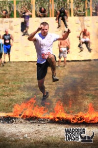 warrior dash jumping over fire